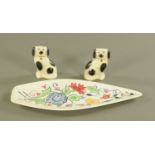 A 1960's Poole pottery shaped dish and a pair of miniature spaniels, dish length 43 cm.