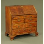 An 18th century walnut bureau,