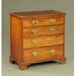 A Georgian red walnut chest of drawers,