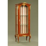 A Continental kingwood display cabinet,