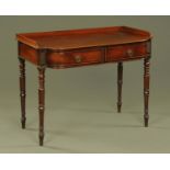 A Regency mahogany desk or dressing table in the manner of Gillows,