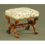 A Victorian stool, with upholstered top and moulded frame,