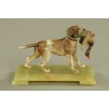 A German cold painted bronze of a gun dog with mallard, raised on an onyx base.