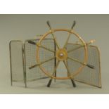 A brass ships wheel, by Brown Bros. & Co. Ltd.