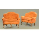A pair of small settees, of shaped outline and with loose cushions,