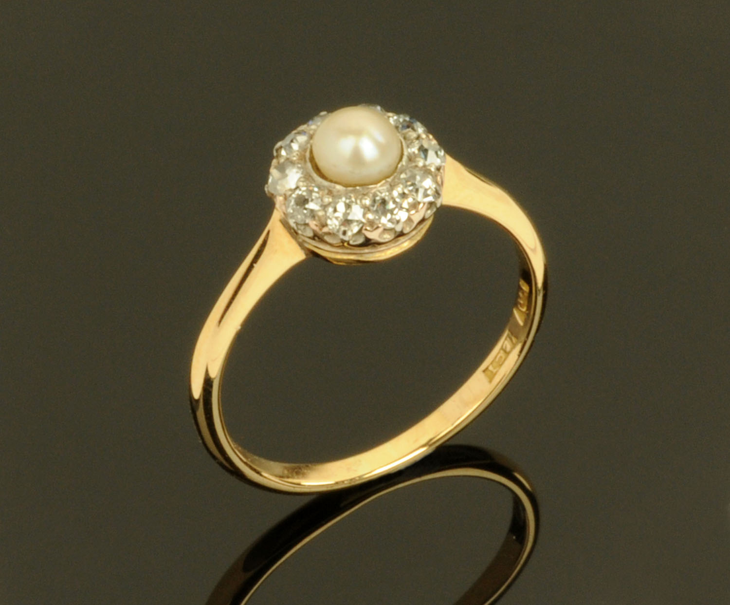 A 9 ct gold pearl and diamond set ring, size O.
