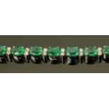 An 18 ct white gold emerald and diamond bracelet, emerald weight +/- 7.80 carats (see illustration).