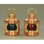 A small pair of brass and copper ships lamps, port and starboard.