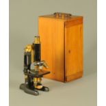 A cased Bausch & Lomb Optical Company Rochester New York USA microscope,