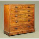 A large Victorian mahogany chest of drawers, with moulded edge and rounded corners,