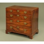 A George III mahogany chest of drawers,