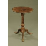 A George III mahogany tripod occasional table, with circular dished top,