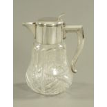 A large cut glass lemonade jug, stamped "DRGM1183647". Height 32 cm.