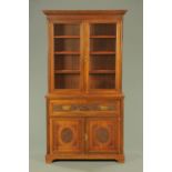 A late Victorian walnut secretaire bookcase,