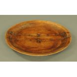 A late 18th/early 19th century sycamore shallow dish. Length 73 cm, width 68 cm.