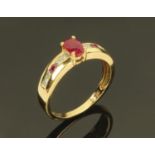 A 9 ct gold ruby and diamond ring, size Q.