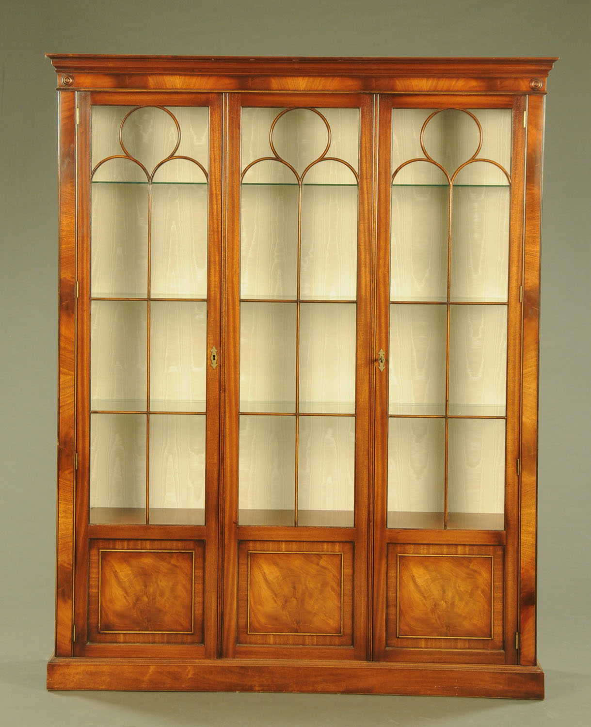 A mahogany display cabinet,