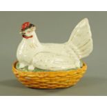 A 19th century Staffordshire hen on nest egg cruet,