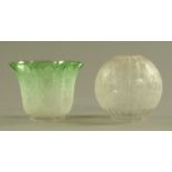 Two Victorian oil lamp shades, green and foliate engraved. Each width +/- 20 cm.