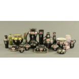 Eighteen pieces of Shelley Rose pattern ware, principally with black ground but some others.