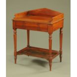 A Victorian mahogany washstand, with three quarter gallery and hinged top to basin aperture,