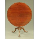 A mahogany tripod table, with piecrust edge, snap action,