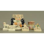 Two pairs of miniature Staffordshire figures, a small Canton lidded pot and a tobacco jar.