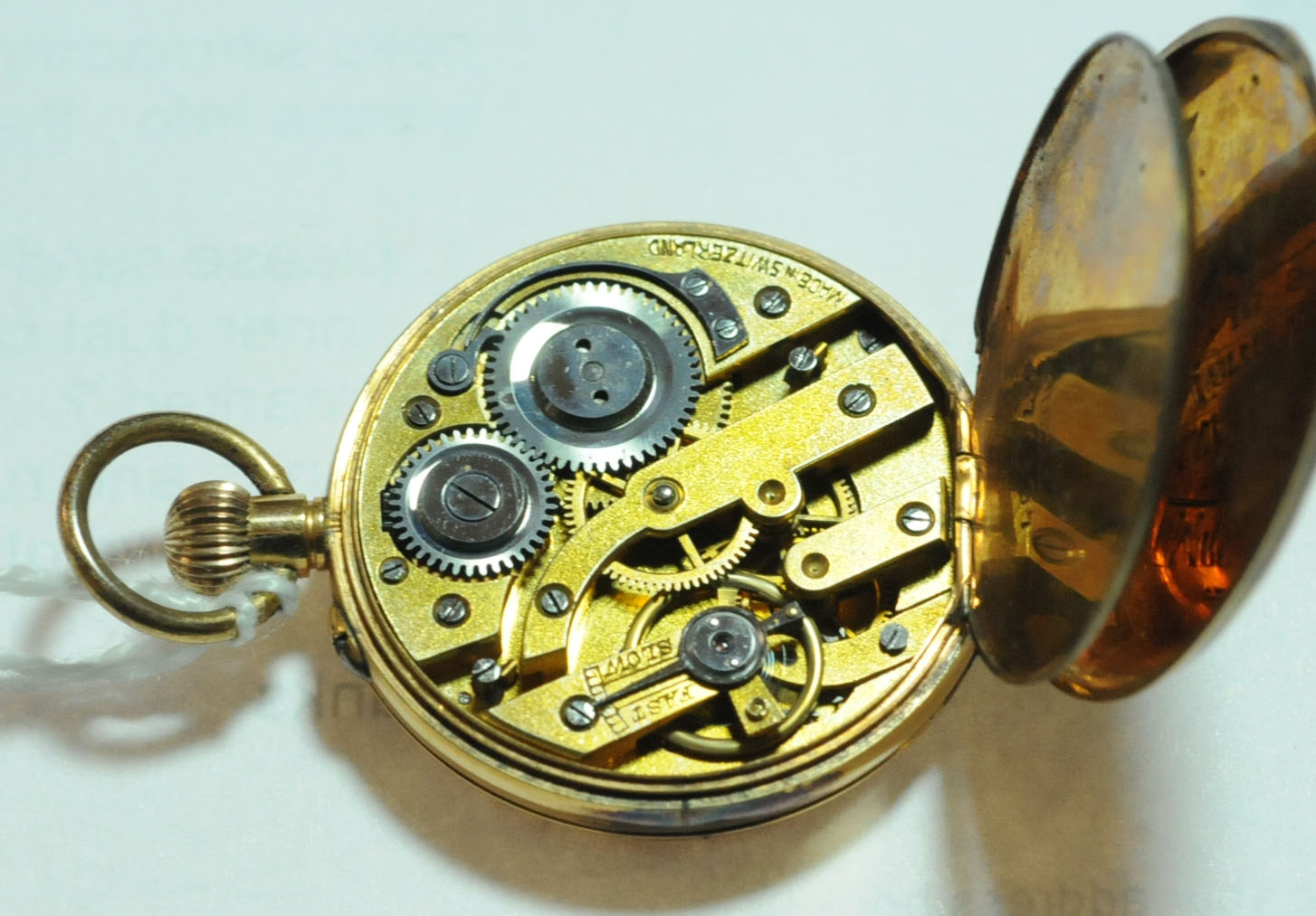 A 9 ct gold cased foliate engraved continental fob watch, stamped 9K, knob wind. Diameter 32 mm. - Image 3 of 7