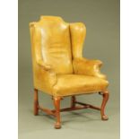 A 19th century mahogany wing easy chair,