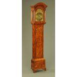 An early 18th century walnut longcase clock, with eight day striking movement by James Gandy,