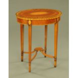 An Edwardian style inlaid mahogany oval occasional table,