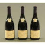 Three bottles of Clos de Vougeot Grand Cru 2000.