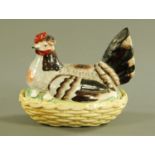 A 19th century Staffordshire hen on nest egg cruet, coloured bird, brown neck, wings and tail,