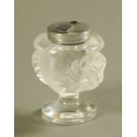 A Lalique frosted glass table lighter, etched "Lalique". Height 11 cm.