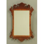 A George III style fretwork wall mirror, mahogany. Height 64 cm, width 39 cm.