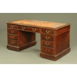 An Edwardian mahogany pedestal desk,