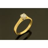 An 18 ct gold solitaire diamond ring, +/- .33 carats, size M/N.