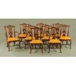 A set of one carver arm and eight single mahogany dining chairs, in the George II style,