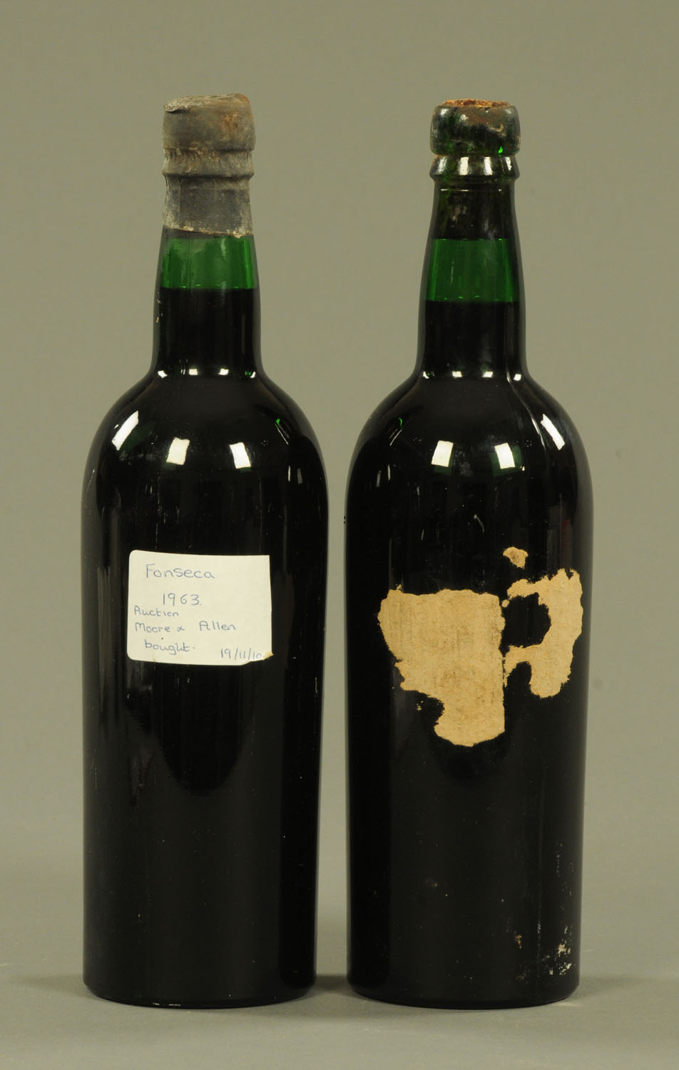 Two bottles 1963 vintage Fonseca port, levels halfway up neck, with provenance. - Image 2 of 2