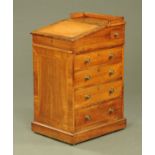 A Regency mahogany Davenport, with sliding top,