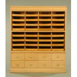 A large oak millinery cabinet,