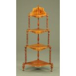 A Victorian mahogany four tier graduated corner whatnot stand, Height 126 cm.