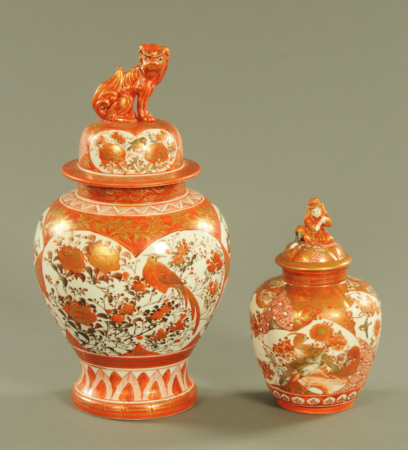 Two Kutani lidded vases, one with dog terminal the other figural, both with character marks.