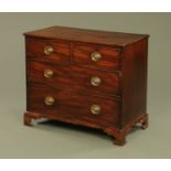 A George III mahogany chest of drawers,