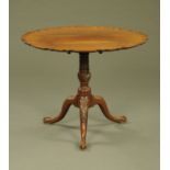 A George III mahogany tripod table, with Chippendale border,