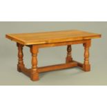 An oak draw leaf refectory style dining table. CONDITION REPORT: Width 92 cm.