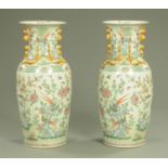 A pair of large decorative Chinese porcelain famille verte style vases,