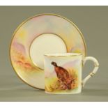 A Royal Worcester cup and saucer, James Stinton Game Birds Series.