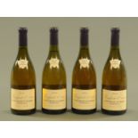 Four bottles of Clos de Vougeot Premier Cru white, one 2001 and three 2004.