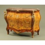 A Louis XV style walnut and kingwood veneered commode chest of drawers,